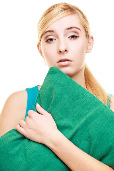 Sleepy tired blonde girl with green pillow — Stock Photo, Image