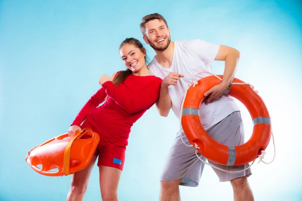 Couple holding  lifesaver equipment — Stock Photo, Image