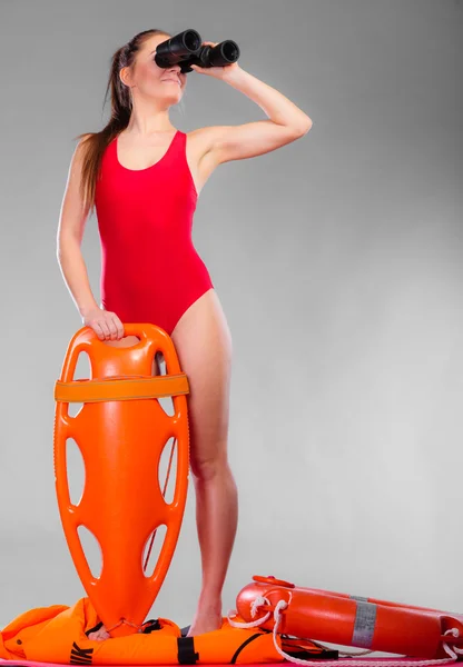 Lifeguard  holding equipment — Stock Photo, Image