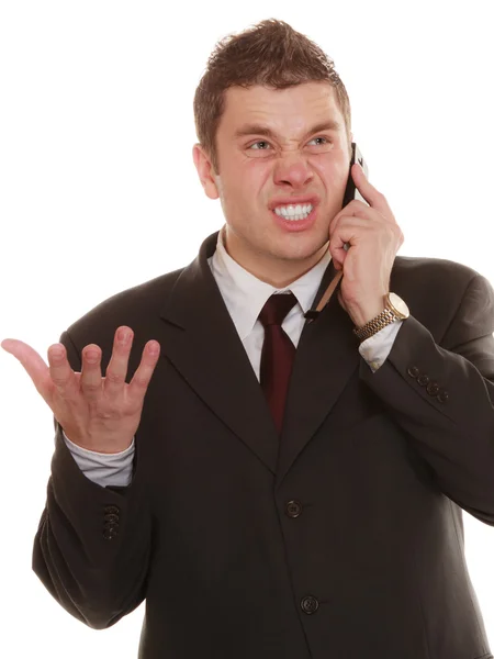 Angry business man talking on phone. — Stock Photo, Image