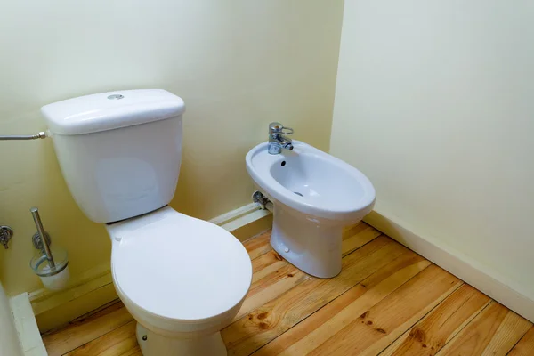 White porcelain bidet and toilet wc. — Stock Photo, Image