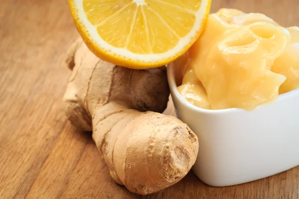 Ginger root, honey and lemon on wooden rustic table. — Stock Photo, Image