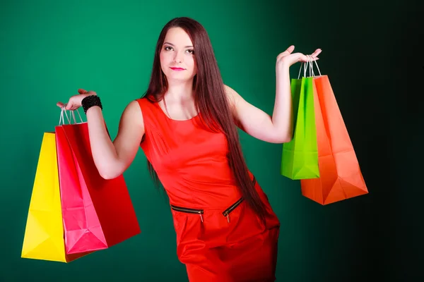 Mujer sosteniendo bolsas —  Fotos de Stock