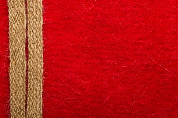 Corde de jute sur fond rouge — Photo