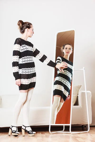 Woman trying on dress — Stock Photo, Image