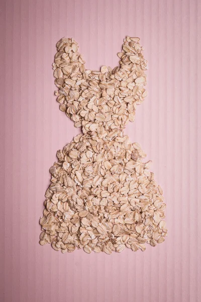 Dress shape made of oatmeal — Stock Photo, Image