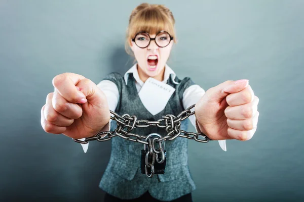 Furious woman with chained hands and contract