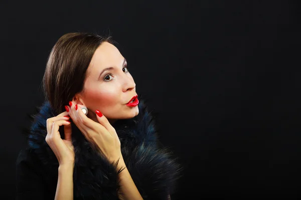 Woman in fur coat posing — Stock Photo, Image