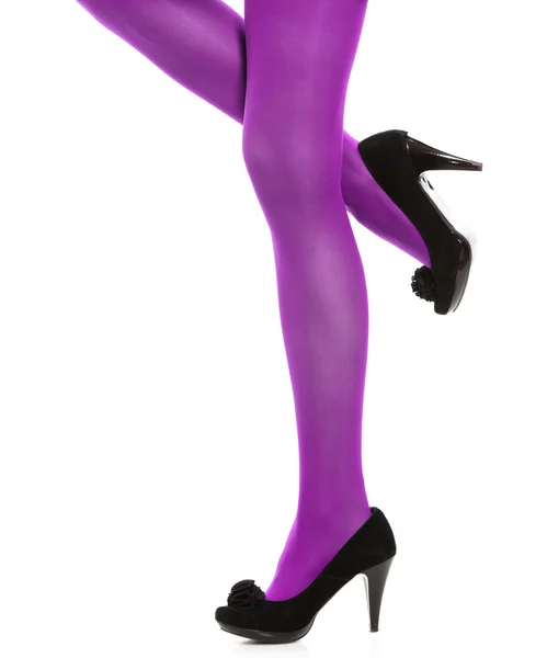 Woman in purple stockings standing — Stok fotoğraf