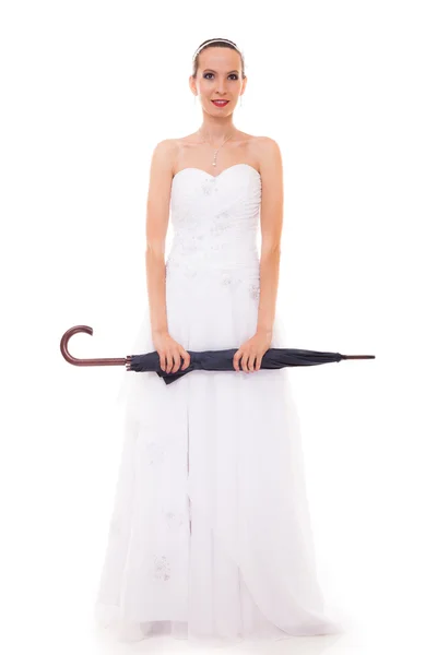 Bride holding umbrella — Stock Photo, Image