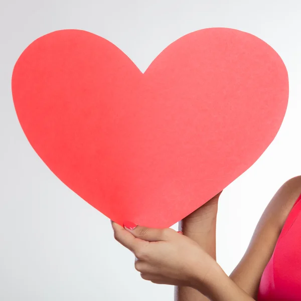Red heart in female hands — Stock Photo, Image