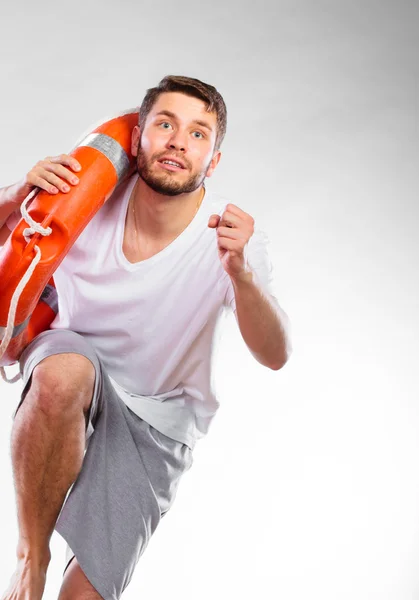 Man lifeguard on duty running — Stock Photo, Image