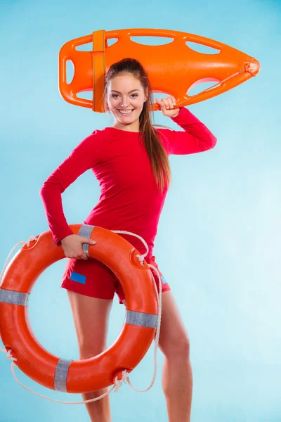 Lifeguard holding rescue equipment — Zdjęcie stockowe