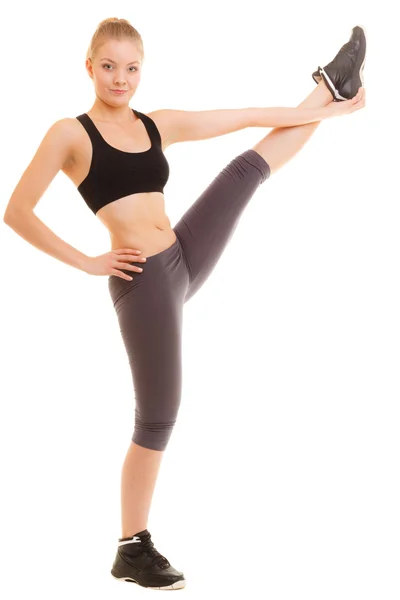 Flicka göra stretching motion — Stockfoto