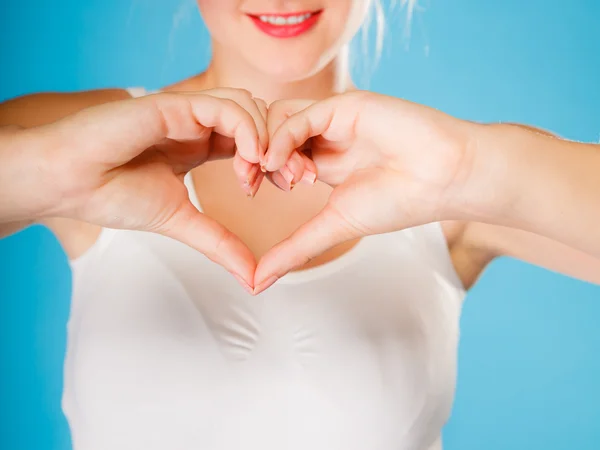 Hands creating heart sign — Stock Photo, Image