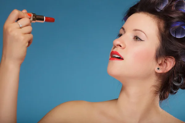 Girl applying red lipstick — Stock Photo, Image