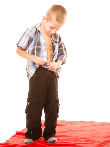 Little boy buttoning on shirt — Stock Photo, Image