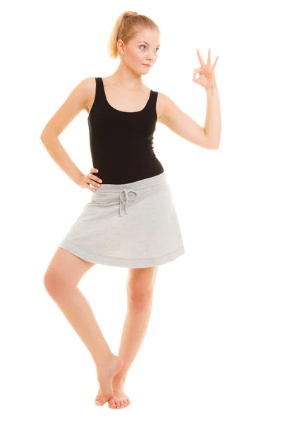 Girl in sportswear showing ok — Stock Photo, Image