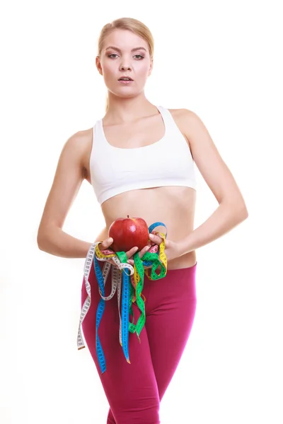 Young woman holding apple — Stock Photo, Image