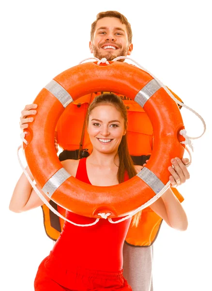 Lifeguards with ring buoy having fun. — Stock Photo, Image