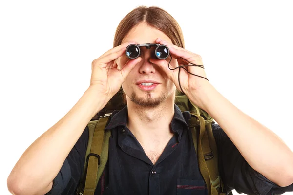 Tourist looking through binoculars. — Stock Photo, Image