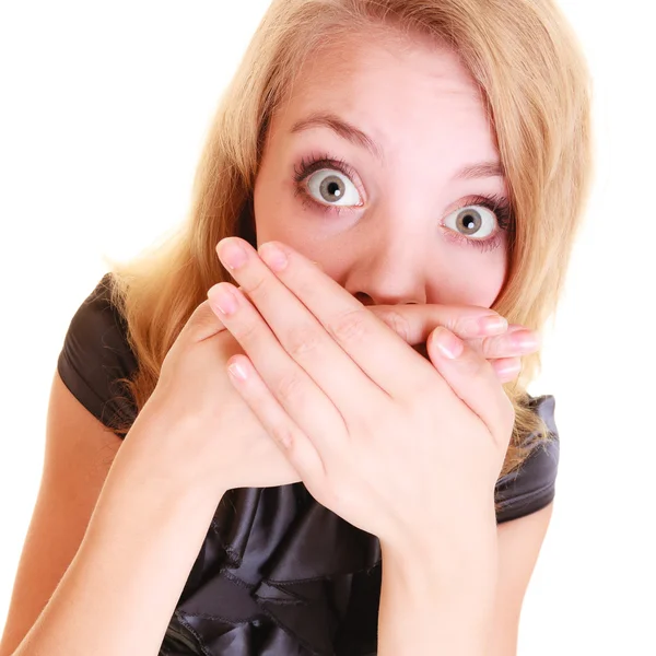 Woman  in black dress covering  mouth — Stock Photo, Image