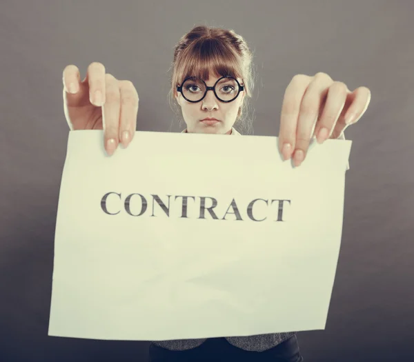 Unhappy business woman showing crumpled contract — Stock Photo, Image