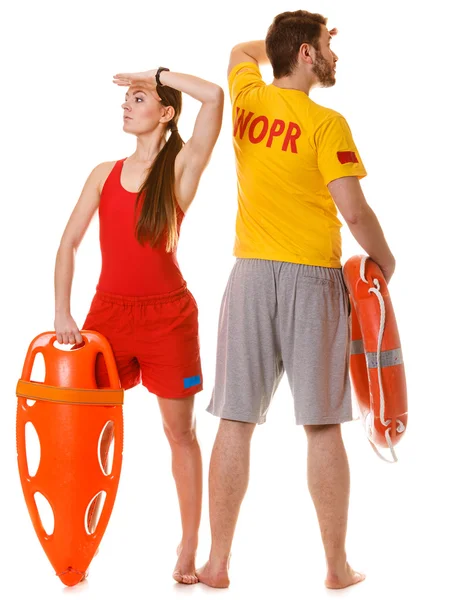 Man and woman supervising swimming pool — Stock Photo, Image