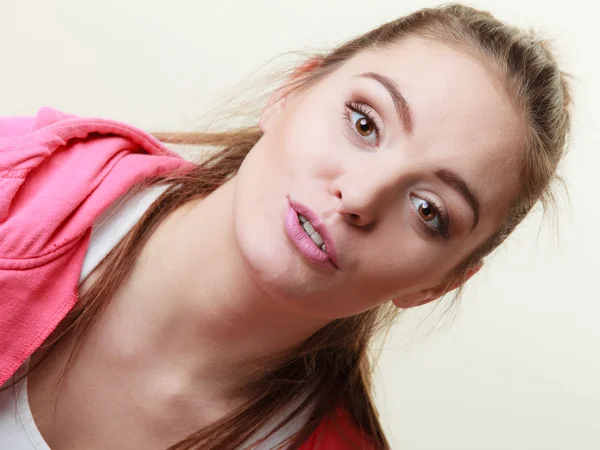 Girl in pink sporty blouse talking — Stock Photo, Image