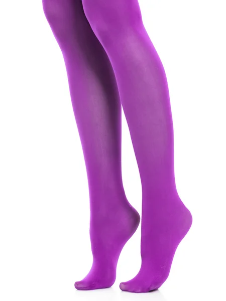 Donna gambe sottili e calze viola isolato — Foto Stock
