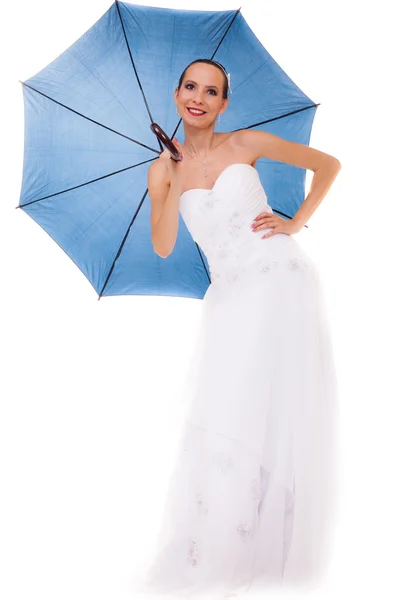 Full length bride in wedding gown holds umbrella — Stock Photo, Image