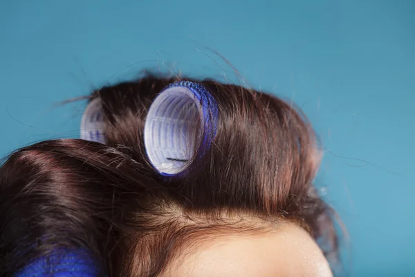 Woman head with hair curlers rollers — Stock Photo, Image