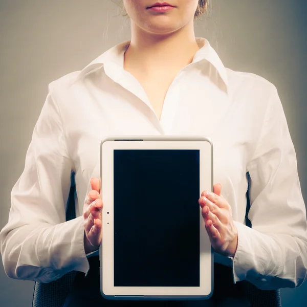 Woman with tablet. Blank screen copy space. Stock Photo