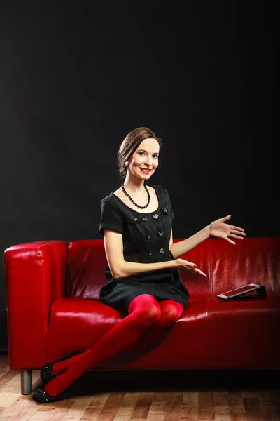 Woman in retro style sitting with tablet — Stock Photo, Image