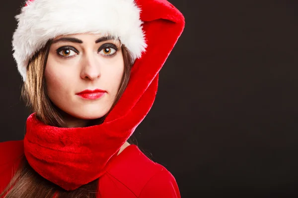 Woman wearing santa claus hat posing — Stock Photo, Image