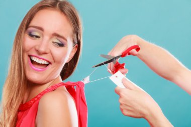 woman  cutting label  off new dress clipart
