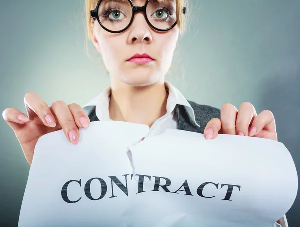 Businesswoman tearing crumpled contract — Stock Photo, Image