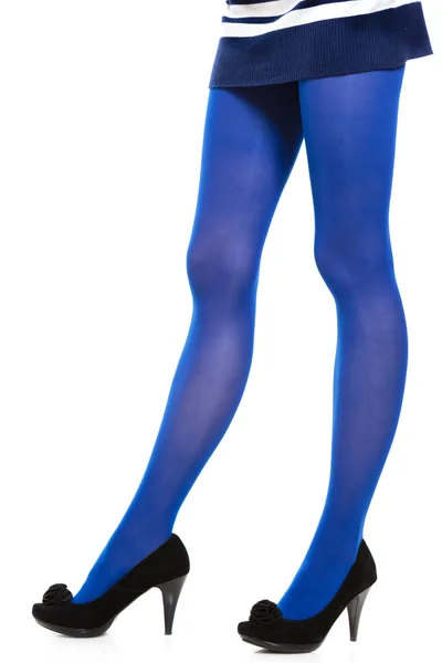 Woman long legs and blue stockings isolated — Stock Photo, Image