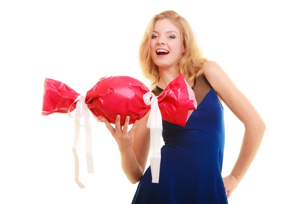 Girl holding  red gift — Stock Photo, Image