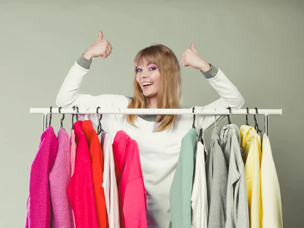 Woman choosing clothes — Stock Photo, Image