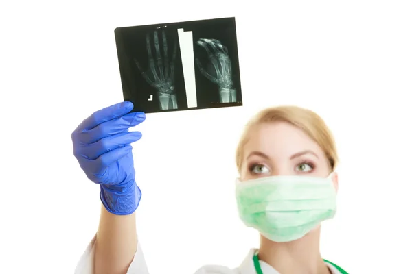 Female doctor examining x-ray images Stock Picture