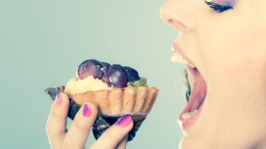 woman  eating cake clipart