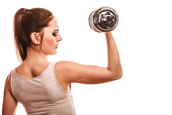 Woman exercising with dumbbell — Stock Photo, Image