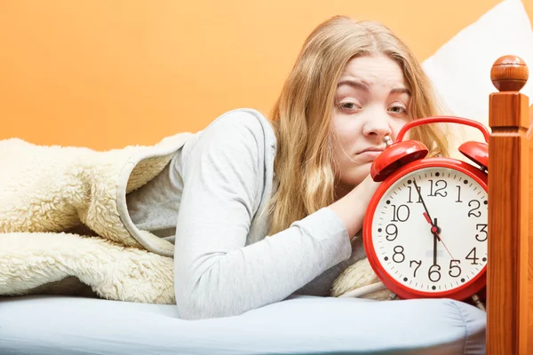 Unhappy woman waking up in bed — Stock Photo, Image