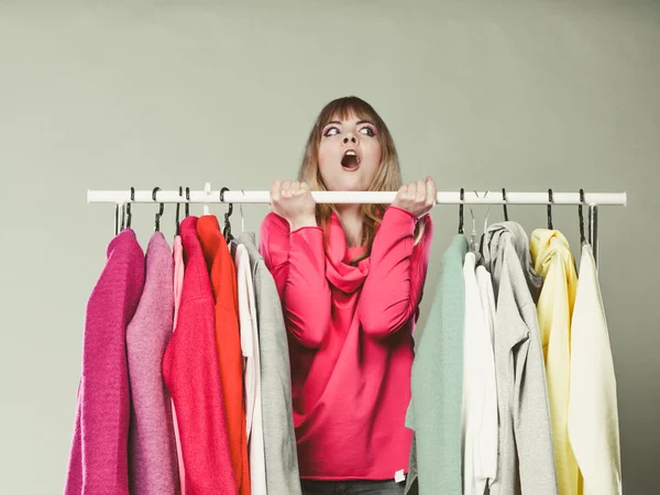 Woman having fun in mall or wardrobe. — Stock Photo, Image