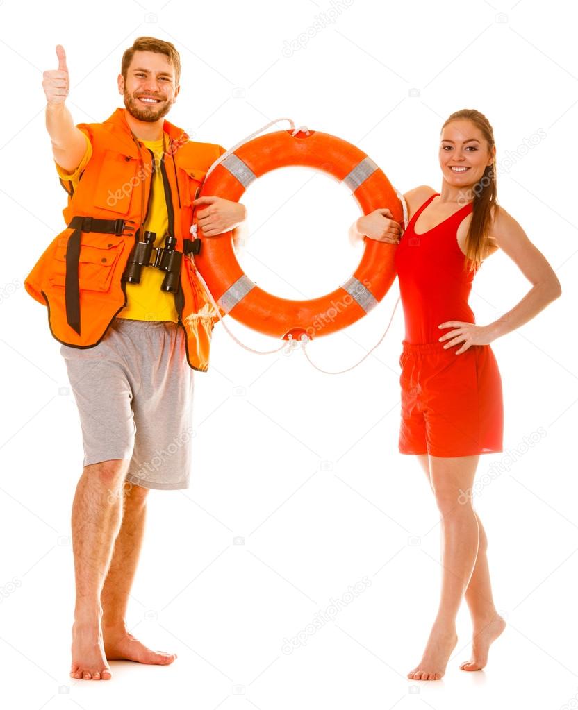 Lifeguards in life vest with ring buoy. Success. Stock Photo by
