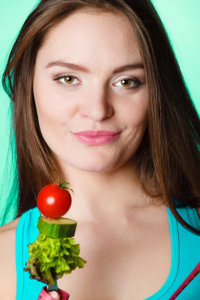 Sporty girl with vegetarian food. — Stock Photo, Image