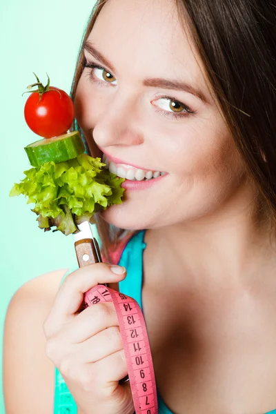 Woman holding vegetables. — Stock Photo, Image