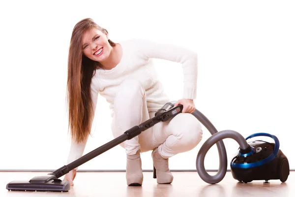 Woman vacuuming the house — Stock Photo, Image