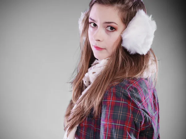 Girl wearing earmuffs posing — Stock Photo, Image